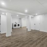 finished basement remodel with high quality laminate wood flooring